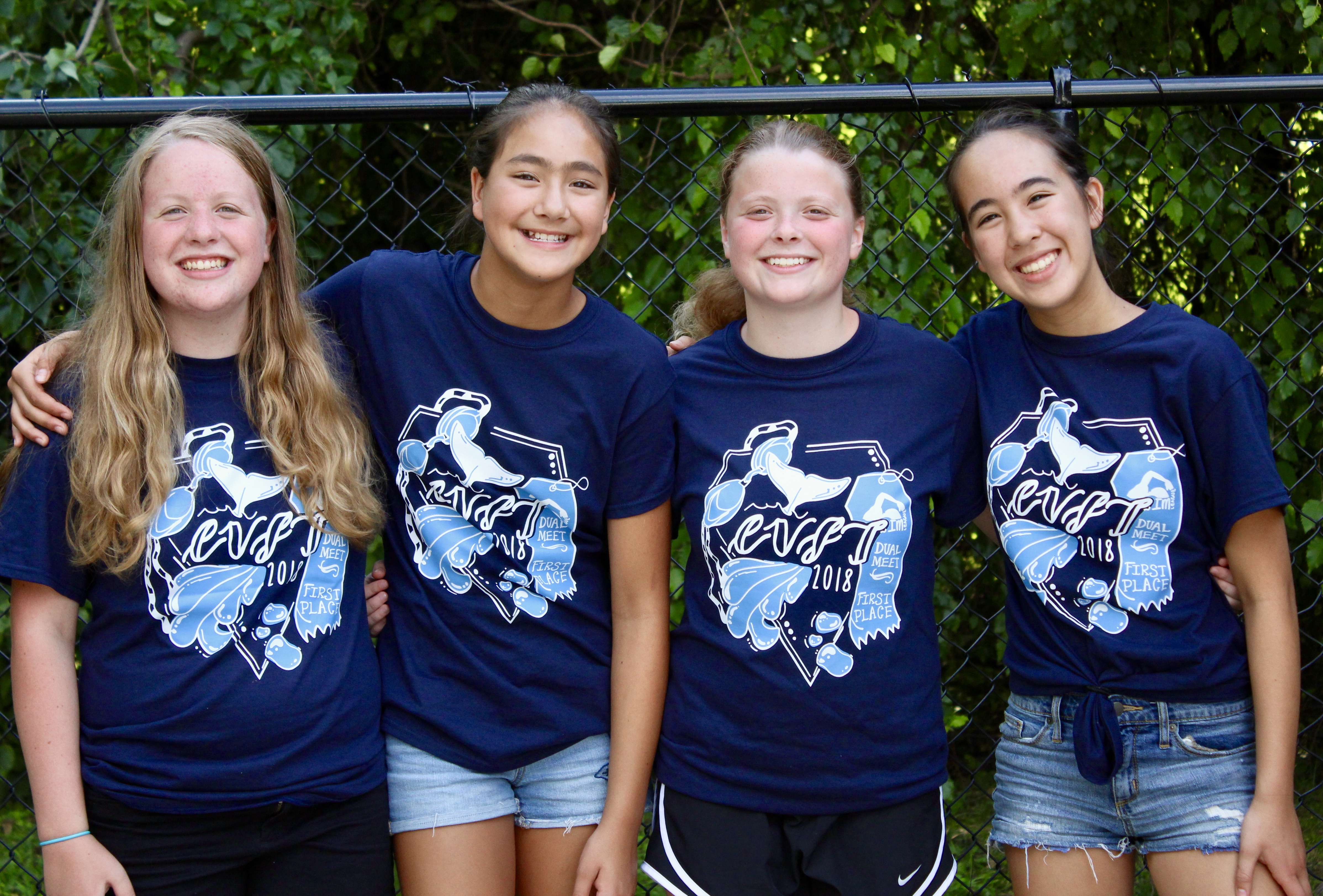 Dolphins wearing team t-shirt